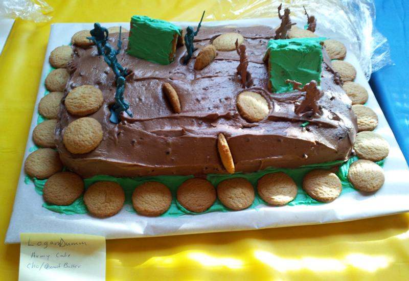 Logan brings us the Army Cake, vanilla waffers, chocolate, peanut butter, and army dudes.  Another excellent combination!